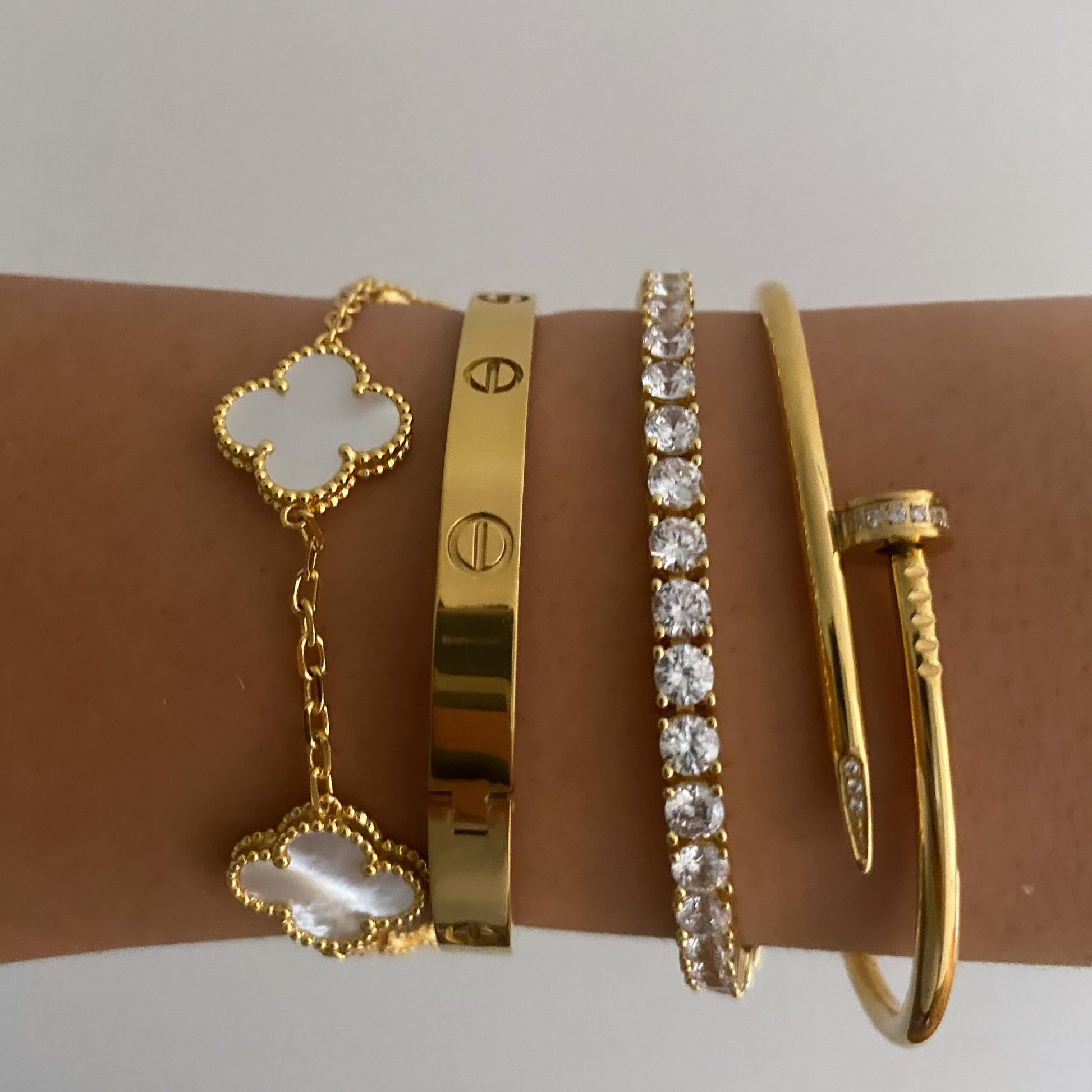 Black Clover Bracelet in soft lighting emphasizing its bold contrast and sophisticated aesthetic.