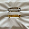 21 cm gold bangle with soft finish and refined shape