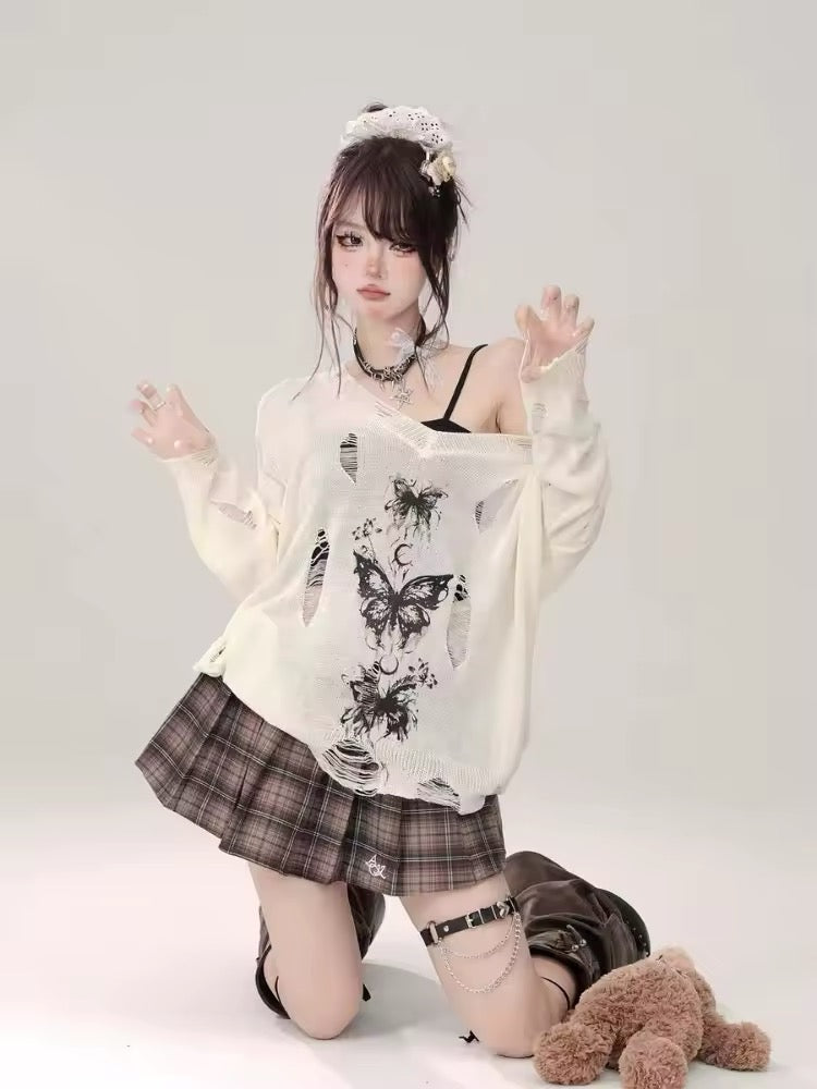 Emo girl modeling fairycore long sleeve top with raw edges