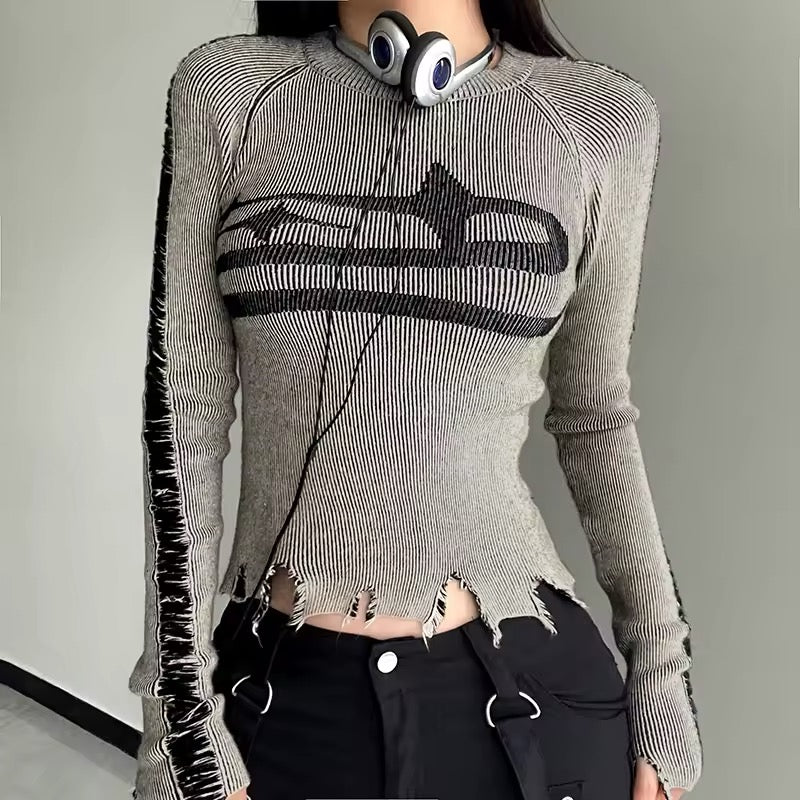 Stitched ripped aesthetic sweater styled with mini skirt