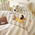 Children's bedroom with striped bedding featuring cartoon dog design, teddy bear, and book.