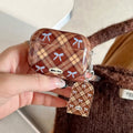 Hard PC material plaid AirPods case with bow keychain and tag