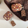 Cute plaid AirPods case with anti-drop protection and girl keychain