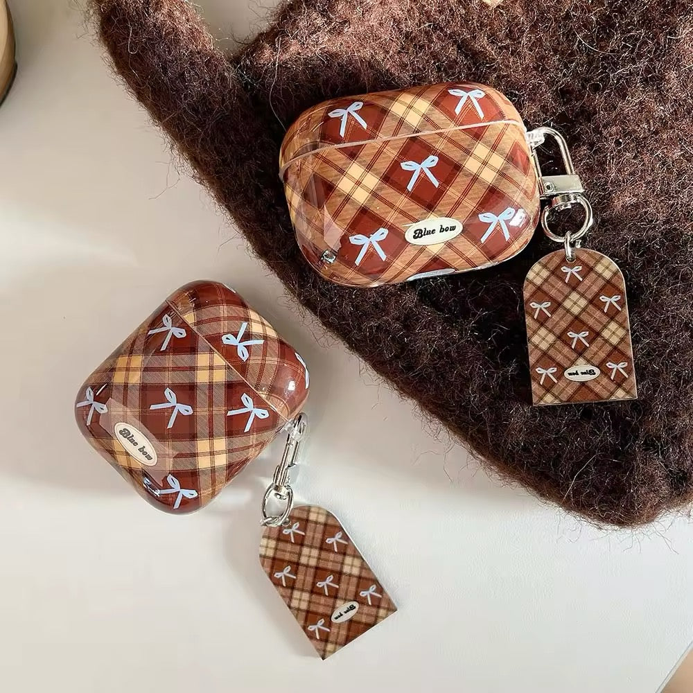 Cute plaid AirPods case with anti-drop protection and girl keychain