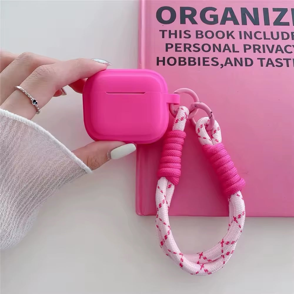 Glossy rose red AirPods cover with charm accessory and hook