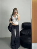 Flat lay of the jeans, highlighting the overall design and fabric.
