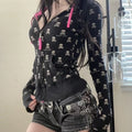 Full-body shot of Y2K goth hoodie outfit styled with accessories.