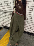 High waist Y2K baggy jeans with green faded wash