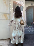 Flare sleeve detail and pleated skirt hem for an elegant look