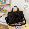 Harajuku-style shoulder bag with ruffles and bow detail, soft microfiber texture