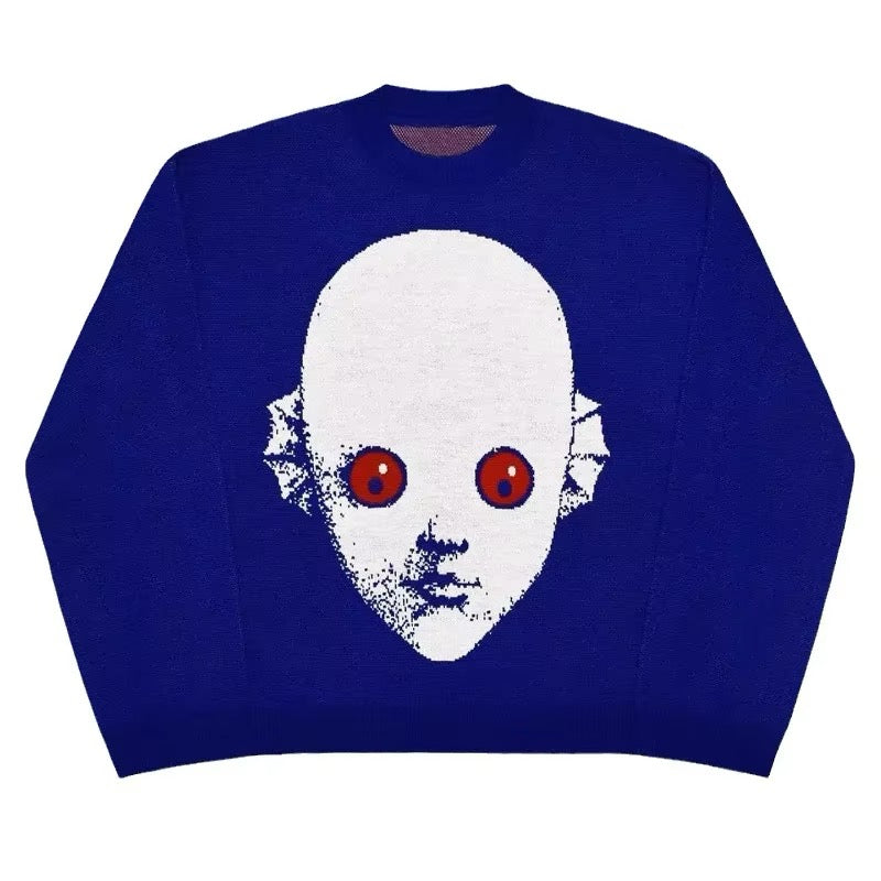 Blue knit sweater featuring a bold white face with red eyes on the front, ideal for Y2K alt fashion