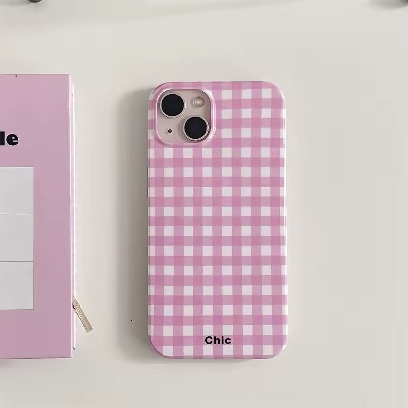 Pink lattice pattern iPhone case with a trendy coquette aesthetic