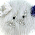 Gothic style silver earrings with moth and natural stone design