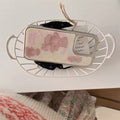 Close-up of the pink bow accent on the kawaii iPhone case