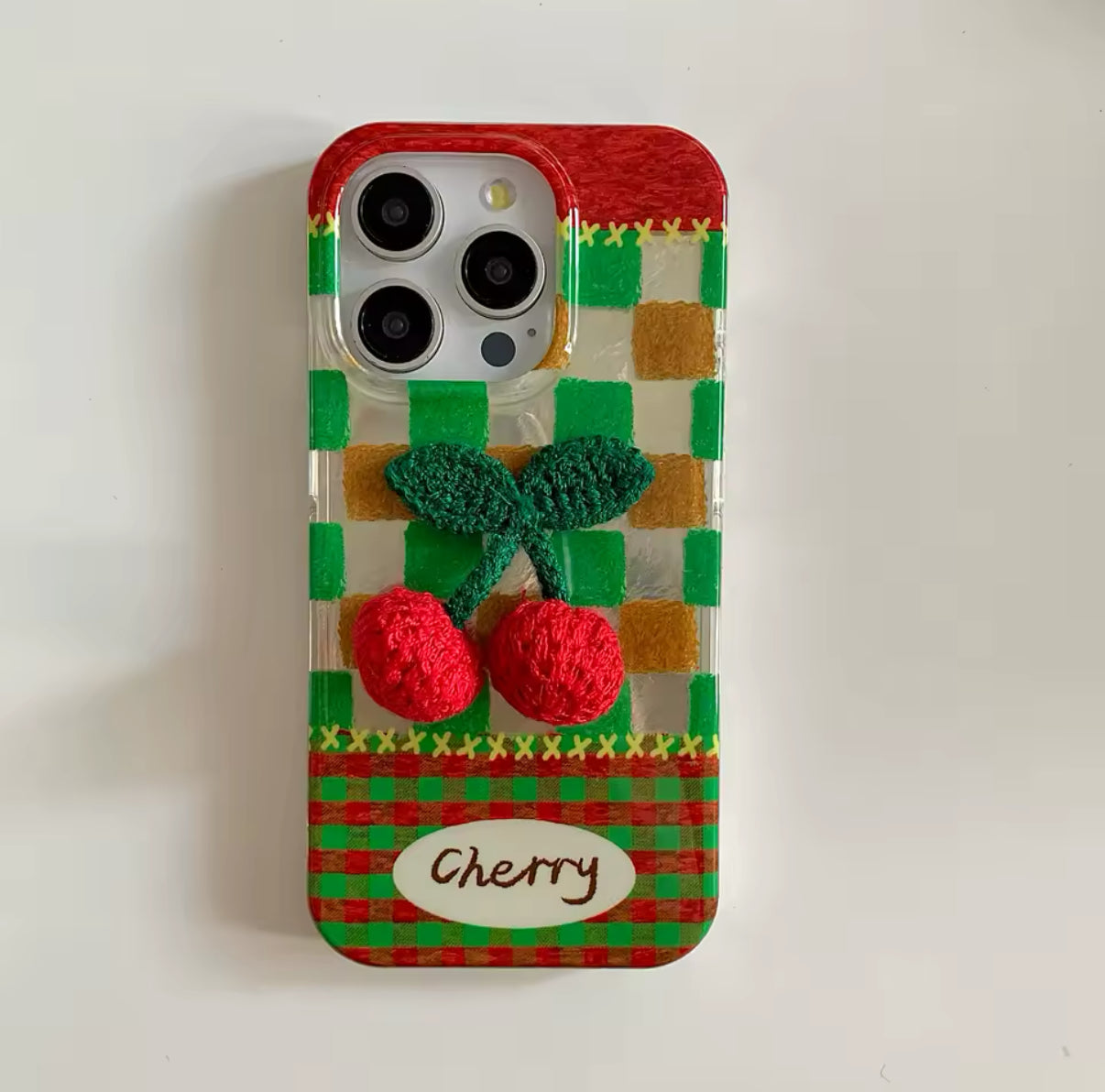 The case shown with a matching pink charging cable and earbuds