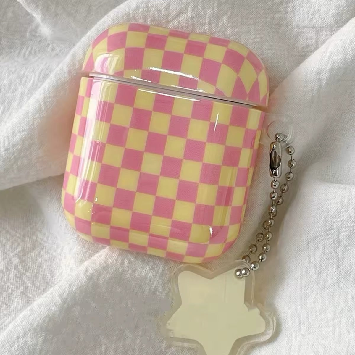 Checkered AirPods case with matching pendant