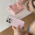 The iPhone case alongside matching balletcore accessories
