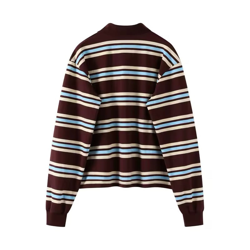 Brown striped polo shirt worn casually on the street