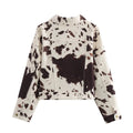 Cozy cropped outerwear with cute cow print design, perfect for soft streetwear and Y2K fashion fans