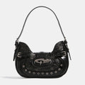 Coquette crescent-shaped mini bag with heart decor, edgy details and detachable strap