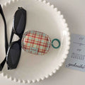 Minimalist plaid design AirPods cover in vintage tone