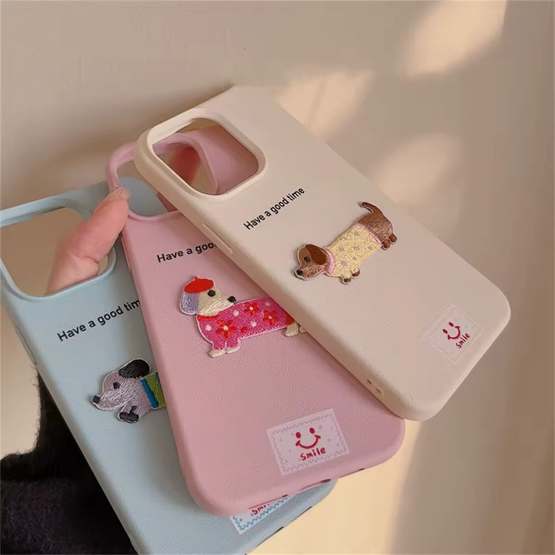 Sweet kawaii dachshund print cover for iPhone 14 Plus in leather texture
