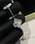 Stylish clover bangle with white gold shine and meaning