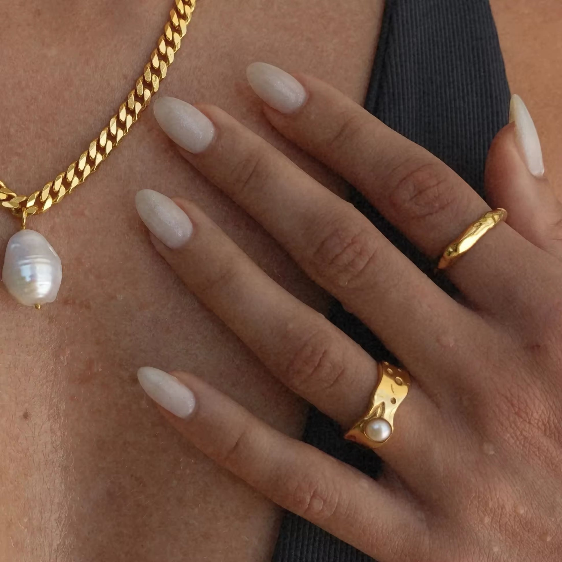 Elegant gold-plated pearl ring with heart-shaped design