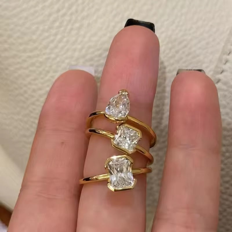 Adjustable zircon heart ring on white background