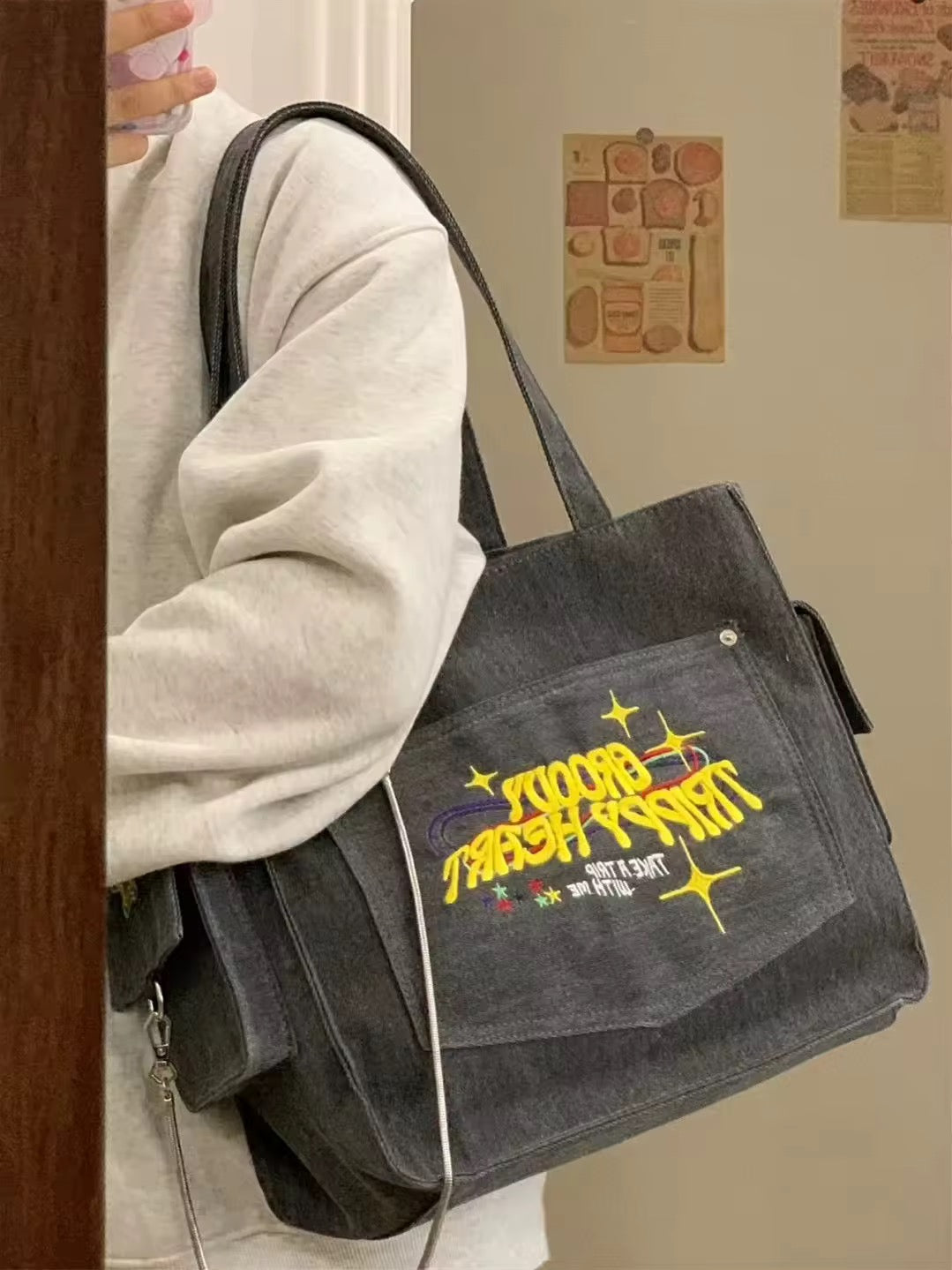 High-capacity canvas tote with yellow groovy lettering
