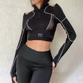 Emo Alt patchwork crop top, Y2K cyberpunk aesthetic long sleeve tee, Mall Goth-inspired fashion with hollow-out mesh panels for edgy streetwear looks
