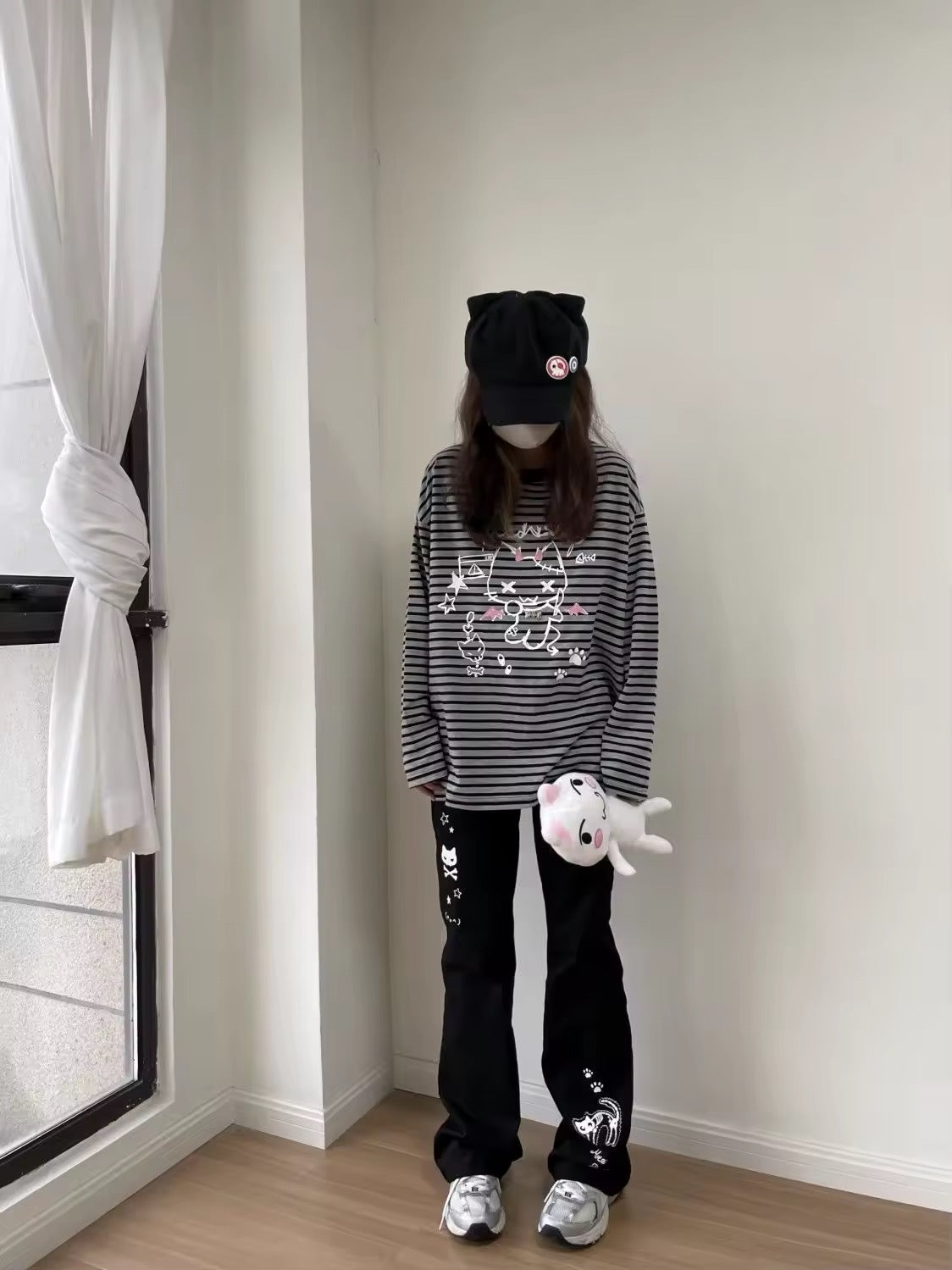 Grunge soft girl outfit with oversized Hello Kitty shirt