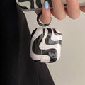 High-gloss AirPods Pro case in trendy streetwear accessory design