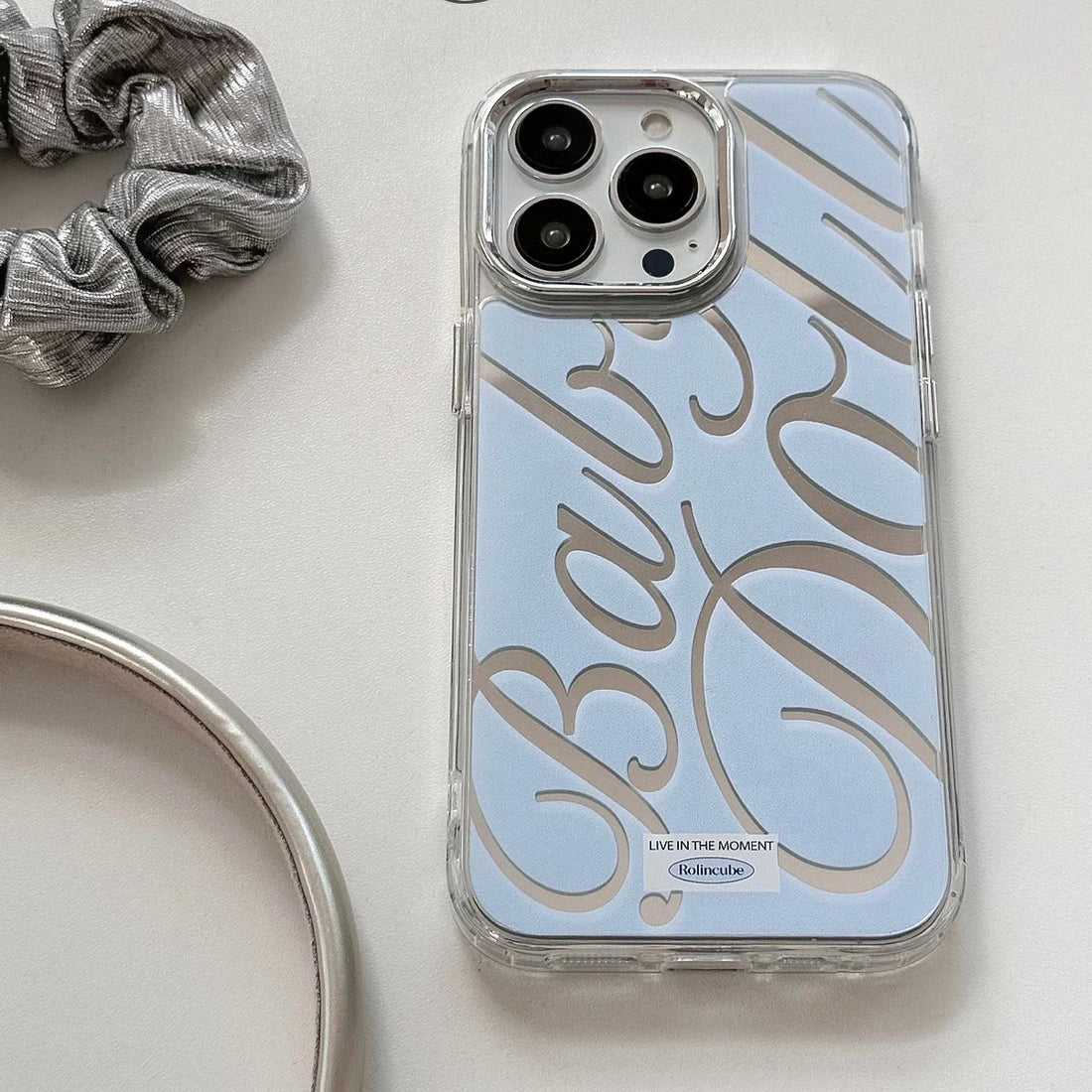 Reflective Blue Baby Doll iPhone Cover for Coquette Lovers