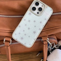 The case displayed on a pastel-themed desk setup, complementing balletcore decor