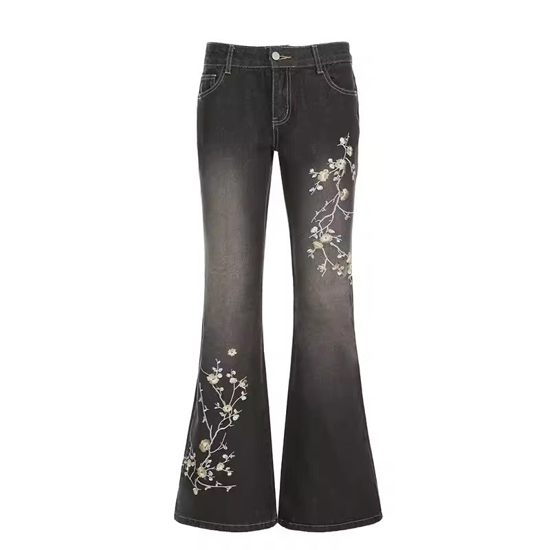 Floral embroidered flare jeans styled with Y2K crop top