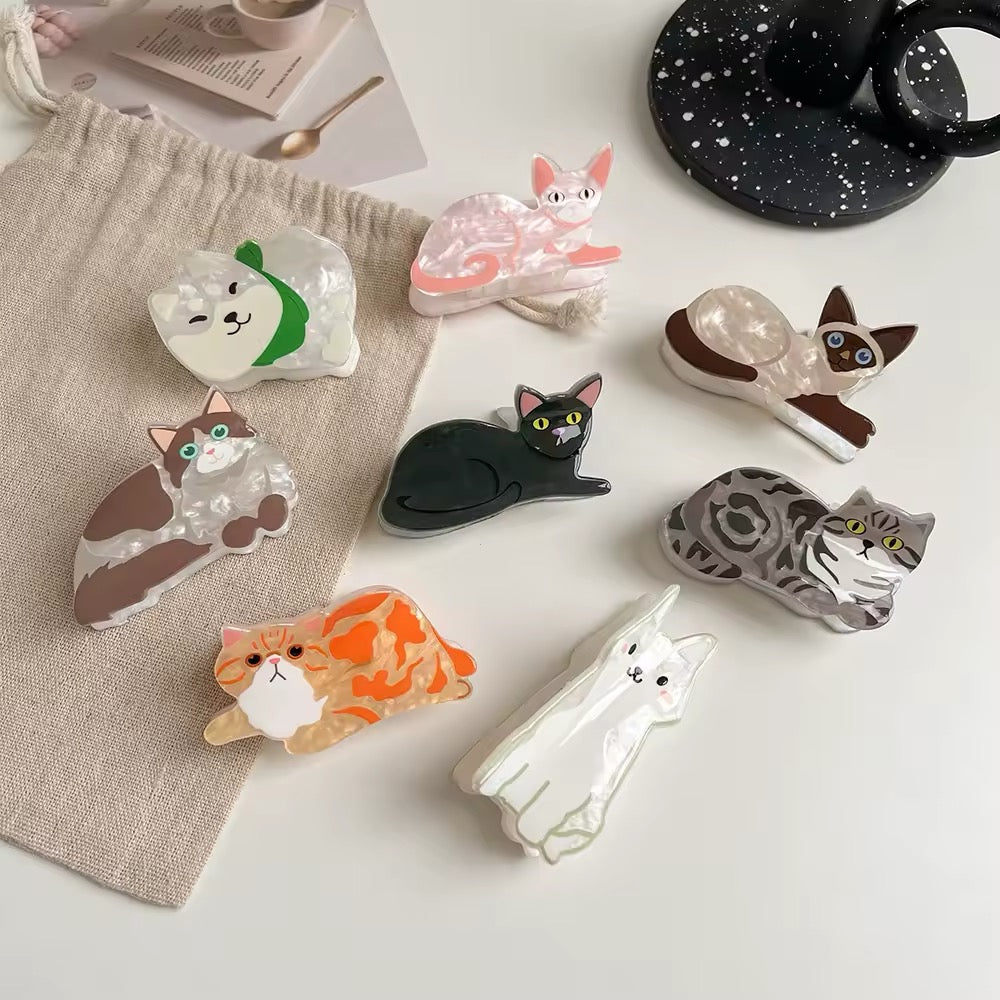 The pink pastel kitten hair claw clip with soft edges, designed for a cute, kawaii hair look
