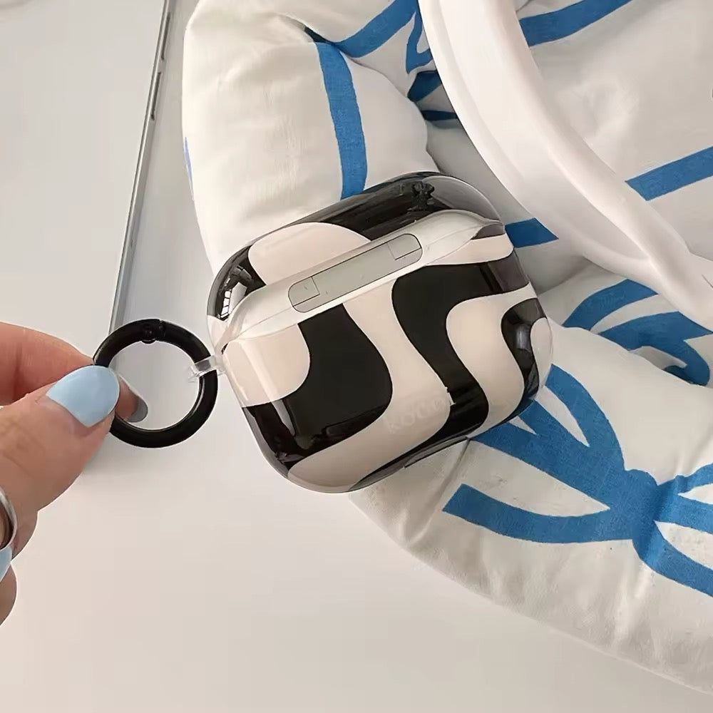 Stylish AirPods Pro 2 case in glossy black and white curved pattern