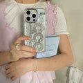 Luxury rhinestone iPhone cover with glossy bling finish