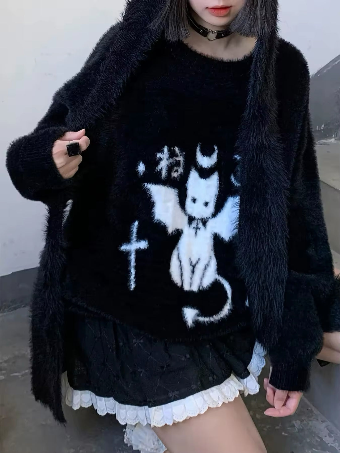 Styled with furry leg warmers and statement boots for edgy fashion look.

