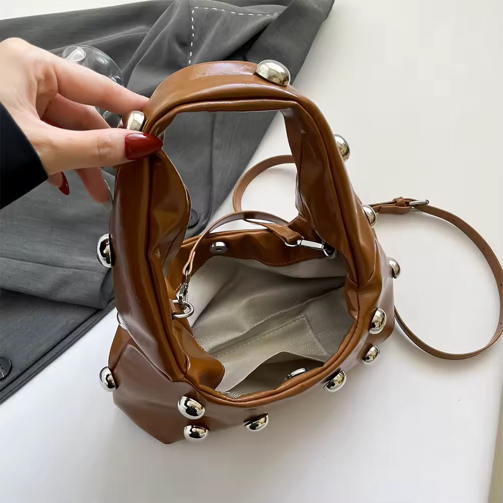 Winter fashion handbag with stud embellishments