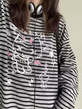 Oversized gothic Hello Kitty shirt in grunge style