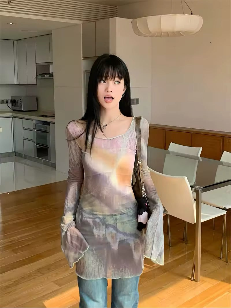 Side angle highlighting the flare sleeves and intricate tie-dye pattern.
