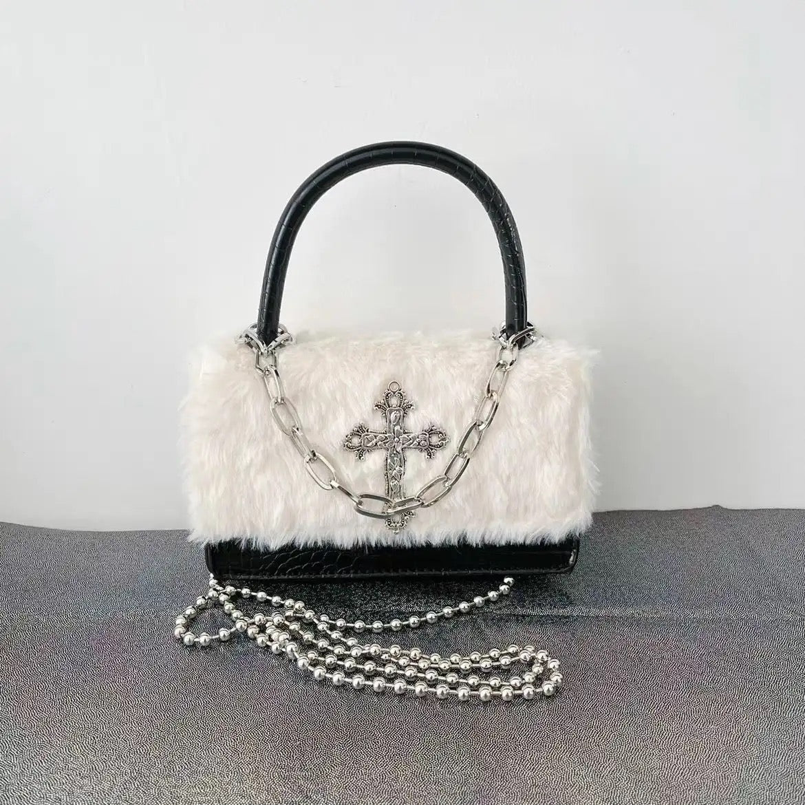 Small gothic bag with plush finish and metallic chain