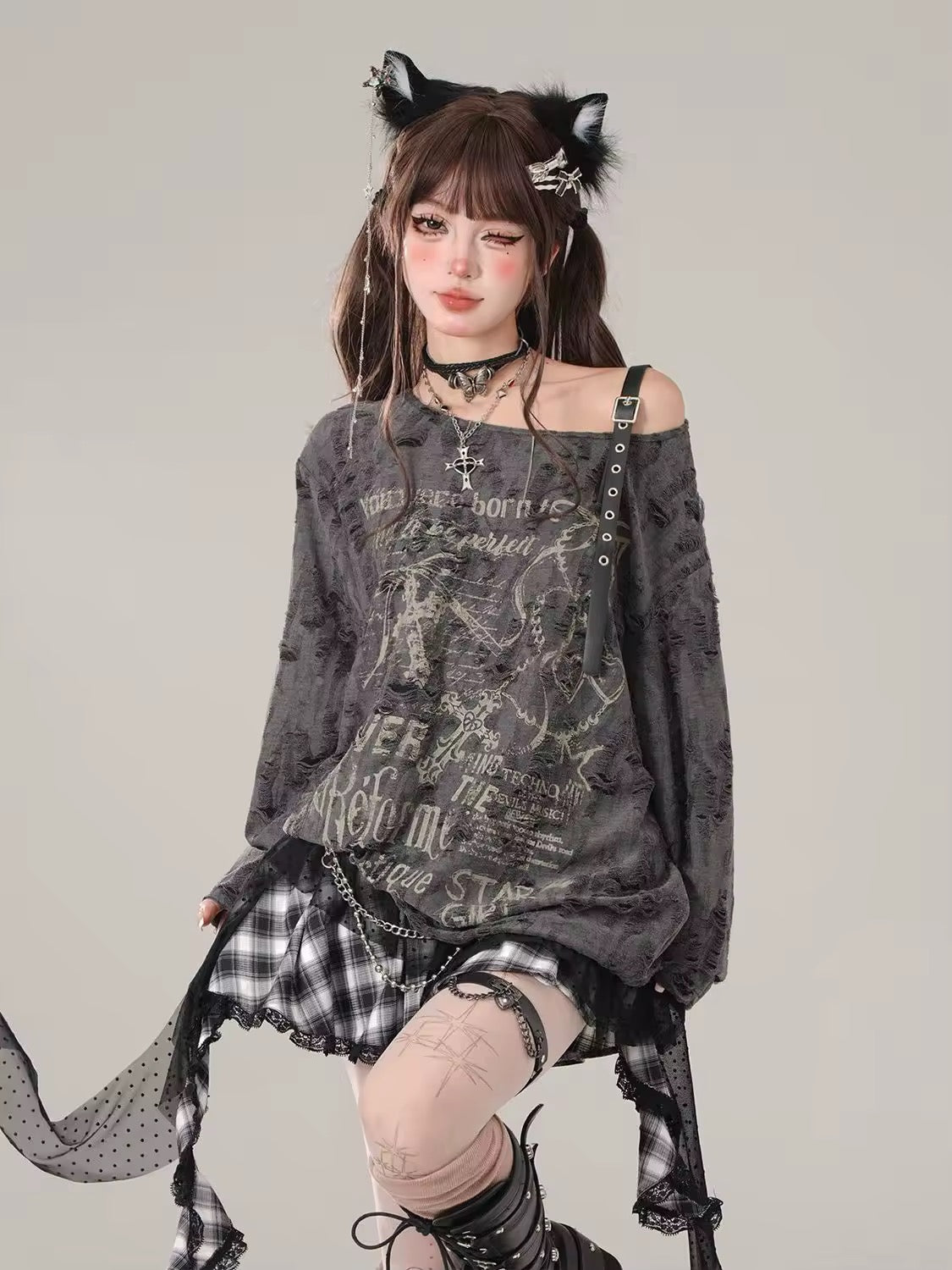 Harajuku punk top styled with boots and plaid accessories