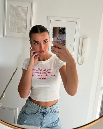 Coquette style summer crop top with short sleeves and bold print