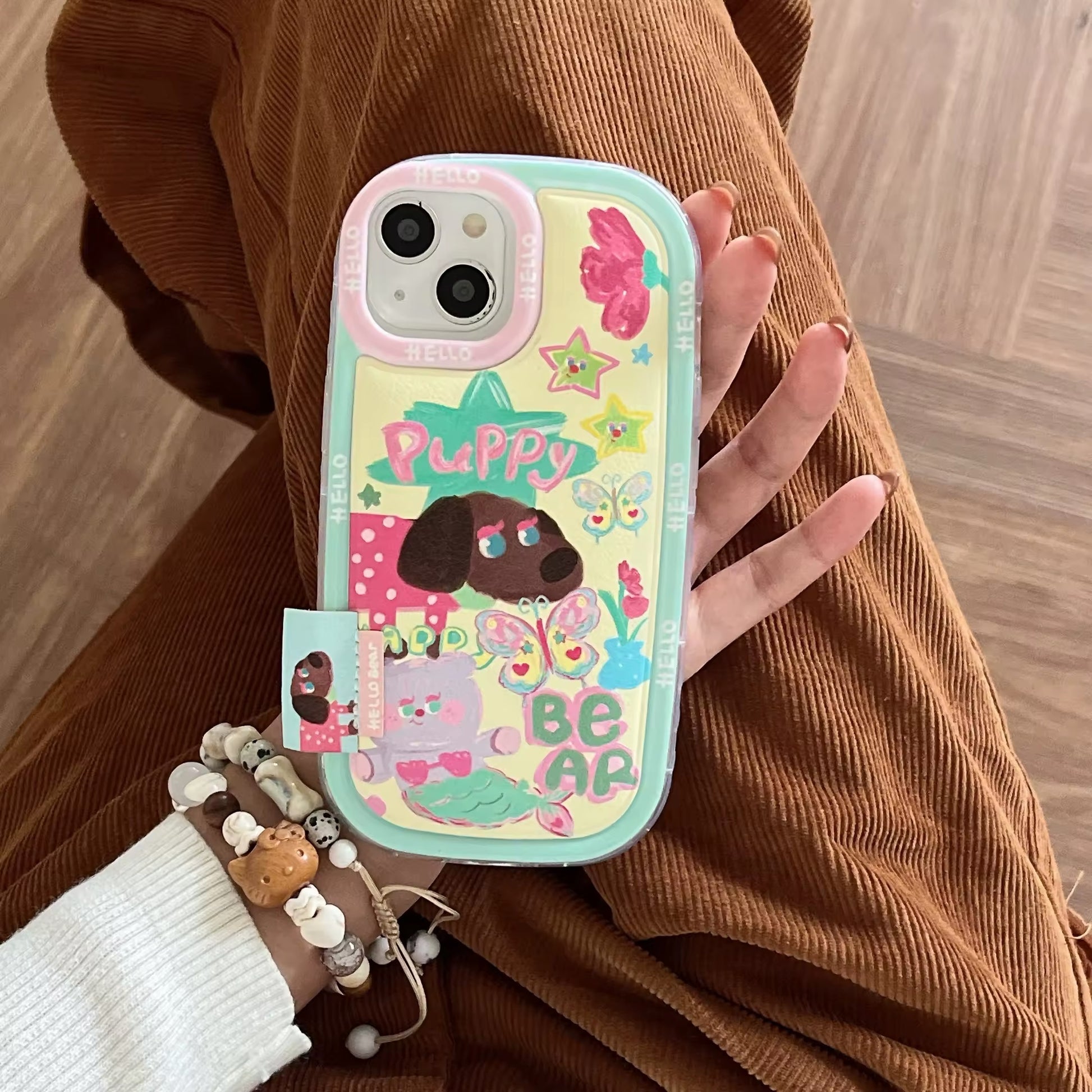 Puffy iPhone 15 case with kawaii dog and bear doodles