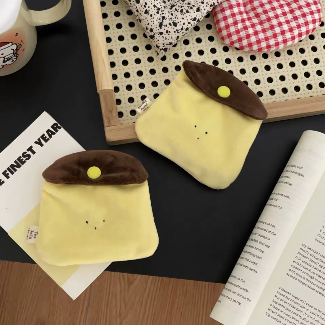 Front view of the Kawaii Caramel Pudding Earphone Bag showcasing its plush design and cute pudding motif