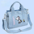 Kawaii embroidered crossbody Snoopy bag on display