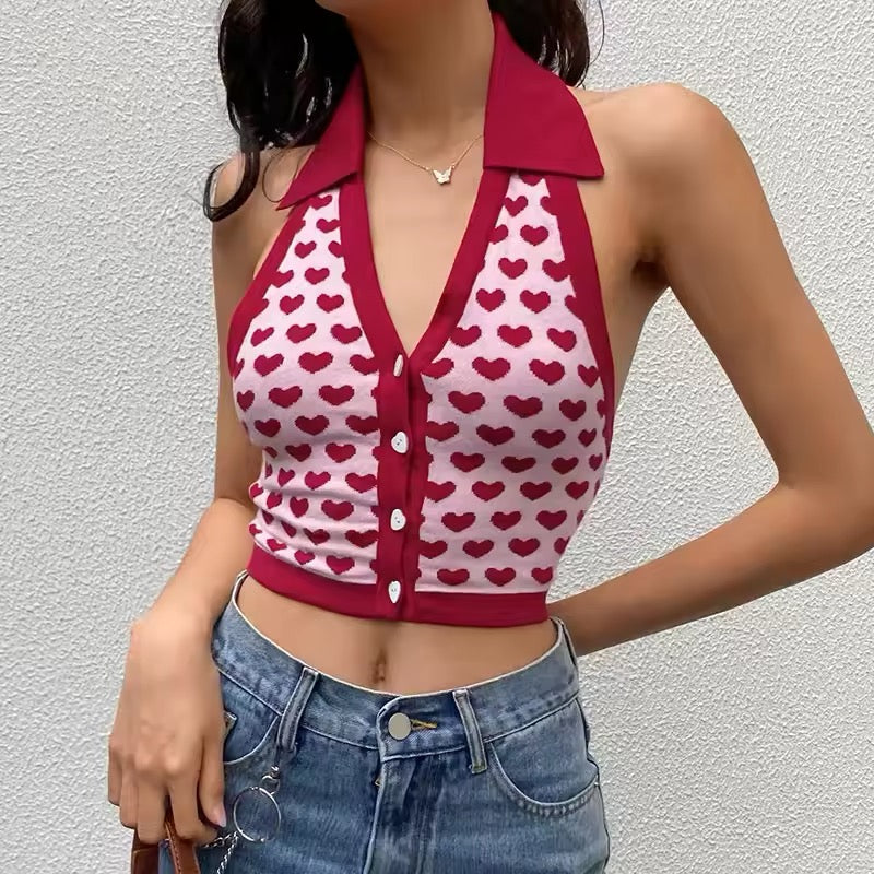 Soft, breathable knit vest with a cute heart design
